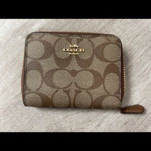 Coach compact wallet in signature logo